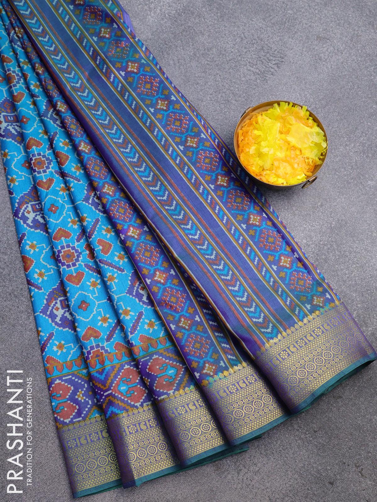 Semi tussar saree dual shade of teal blue and blue with allover patola  prints and ikat woven zari border at 99000 by Prashanti – Prashanti Sarees