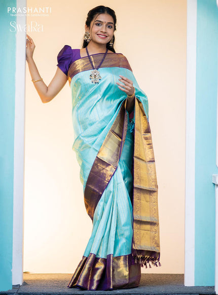 Pure kanjivaram silk saree light blue and violet with allover silver & gold zari weaves and long zari woven border