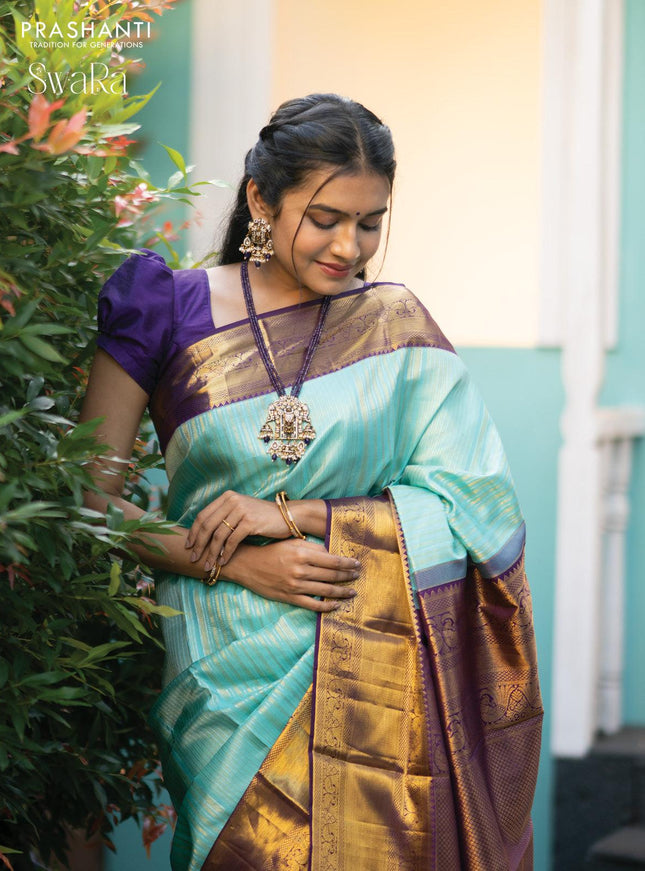 Pure kanjivaram silk saree light blue and violet with allover silver & gold zari weaves and long zari woven border