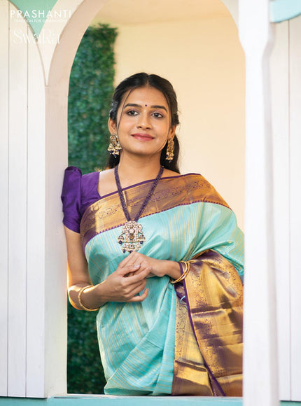 Pure kanjivaram silk saree light blue and violet with allover silver & gold zari weaves and long zari woven border