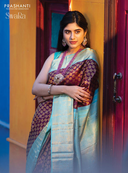 Pure kanjivaram silk saree deep purple and teal blue shade with allover annam zari woven butta weaves and rich zari woven border