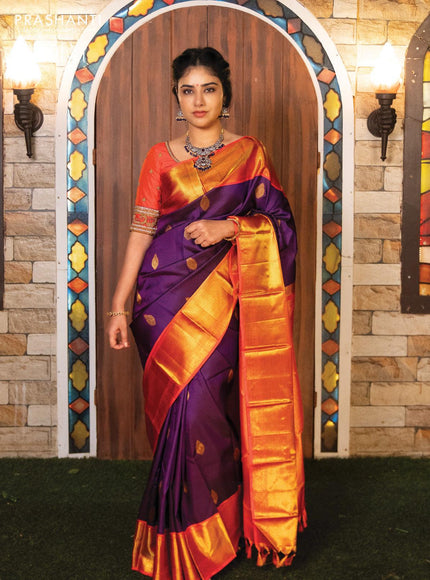 Pure kanjivaram silk saree dark blue and dual shade of pinkish orange with allover self emboss & zari buttas and rich zari woven border