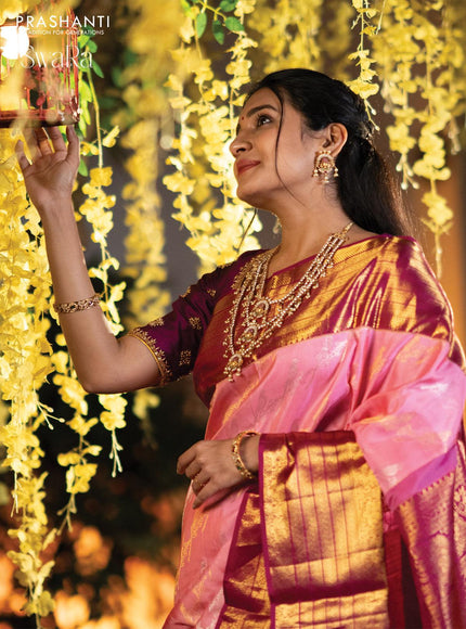 Pure kanjivaram silk saree light pink and pink with allover zari weaves and long zari woven border