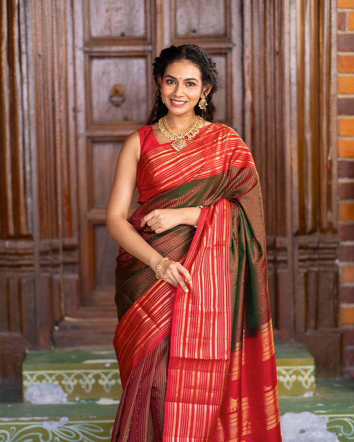 Pure soft silk saree manthulir green and red with allover zari weaves and long zari woven border