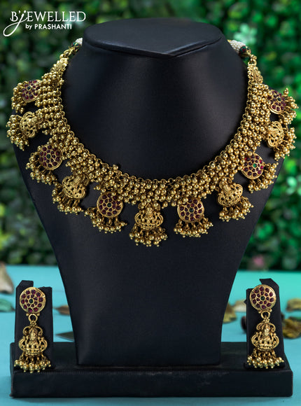 Antique necklace lakshmi design with kemp stones and golden beads hangings