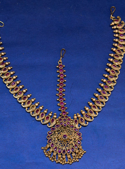 Antique maang tikka manga pattern with pink kemp stones and golden beads hangings