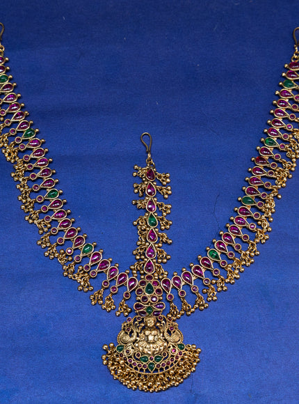 Antique maang tikka lakshmi design with kemp stones and golden beads hangings