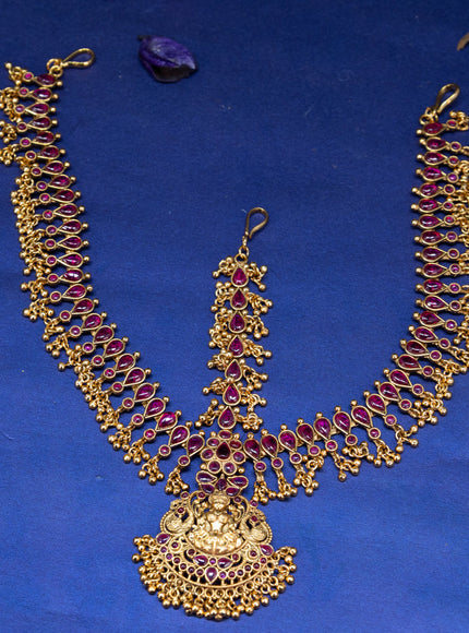 Antique maang tikka lakshmi design with pink kemp stones and golden beads hangings