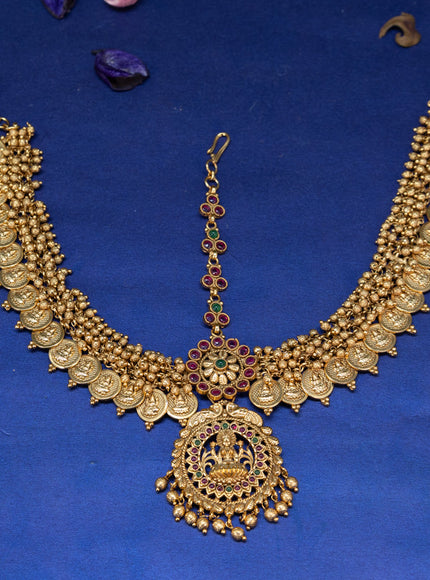 Antique maang tikka lakshmi design with kemp stones and golden beads hangings