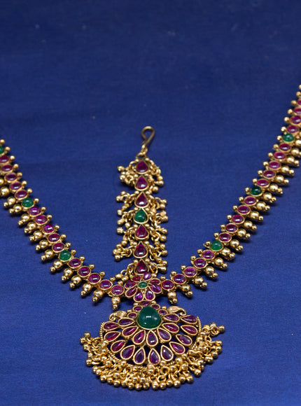 Antique maang tikka with kemp stones and golden beads hangings