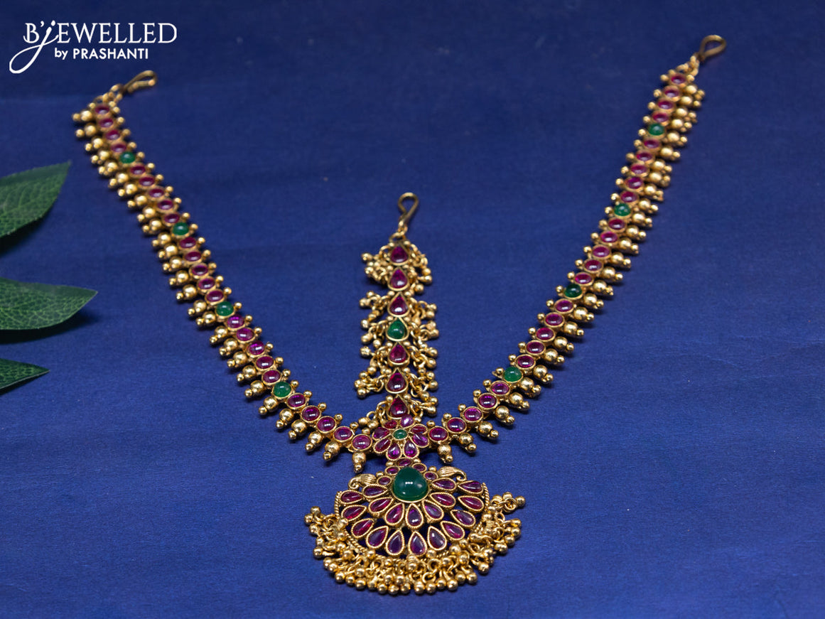 Antique maang tikka with kemp stones and golden beads hangings