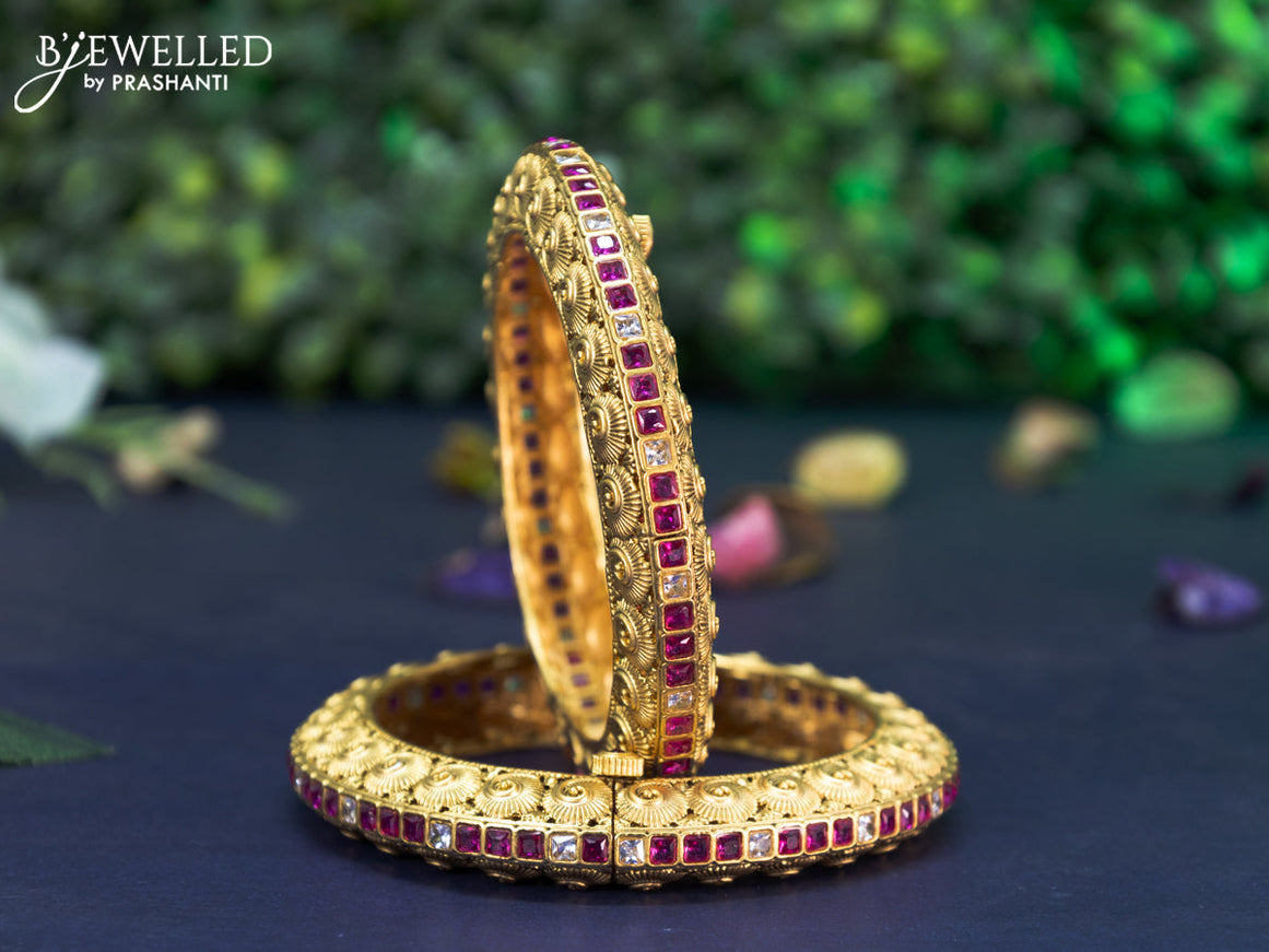 Antique screw type bangle with pink kemp and cz stones