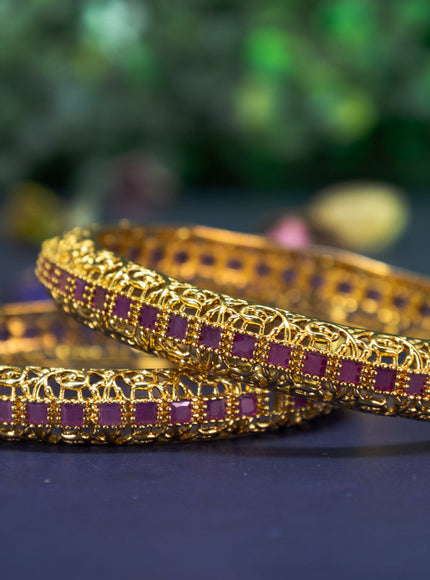 Antique bangle with pink kemp stones