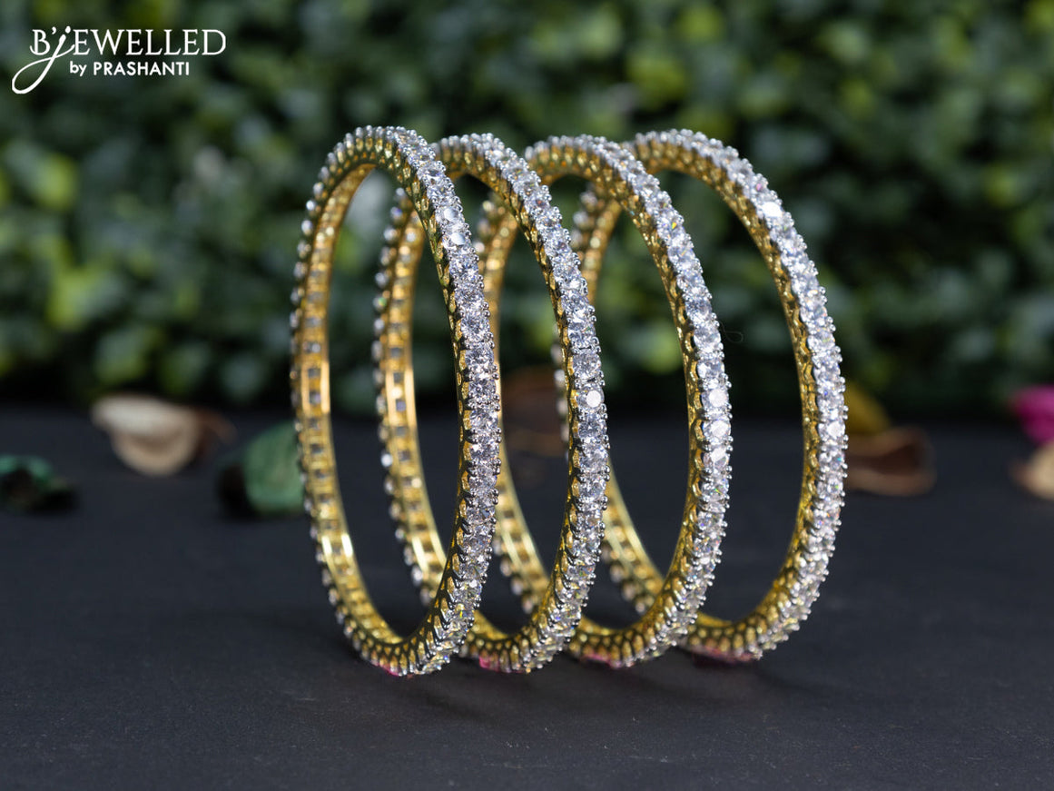 Zircon bangle with cz stones in gold finish