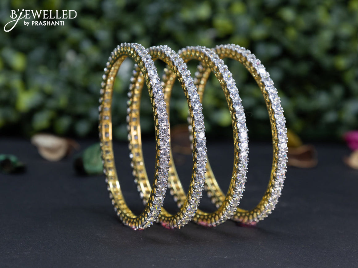 Zircon bangle with cz stones in gold finish