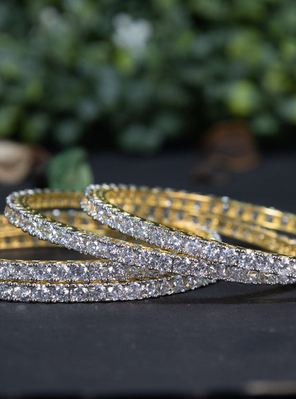 Zircon bangle with cz stones in gold finish