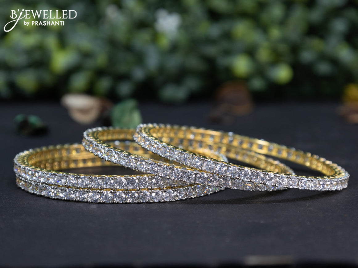 Zircon bangle with cz stones in gold finish