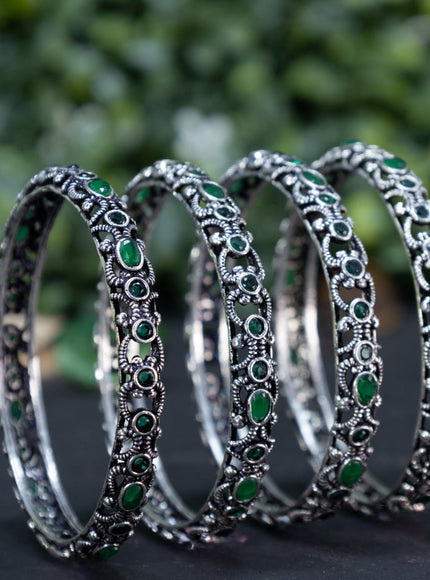 Oxidised bangle with emerald stones