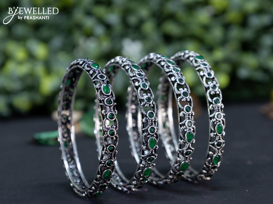 Oxidised bangle with emerald stones