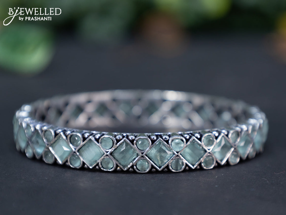 Oxidised bangle with mint green stones