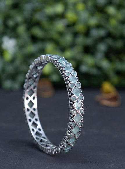 Oxidised bangle with mint green stones