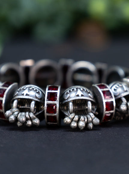 Oxidised screw type bangle with maroon stones