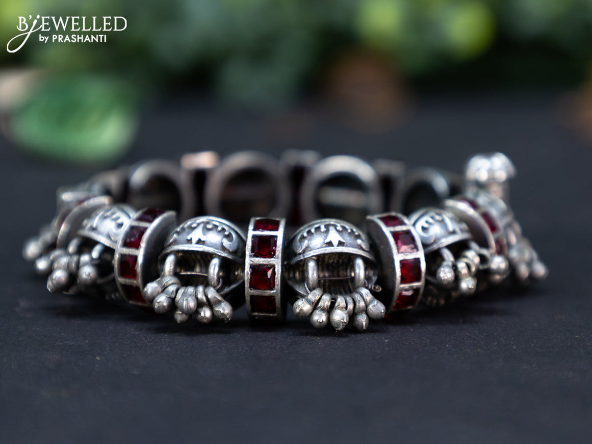 Oxidised screw type bangle with maroon stones