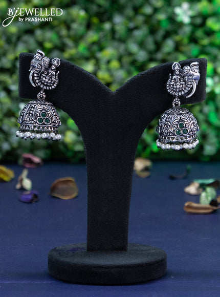 Oxidised jhumka lakshmi design with emerald stones and pearl hangings