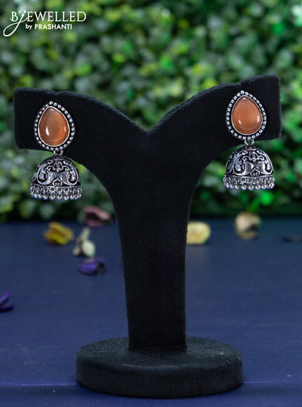 Oxidised jhumka with honey shade stones and hangings