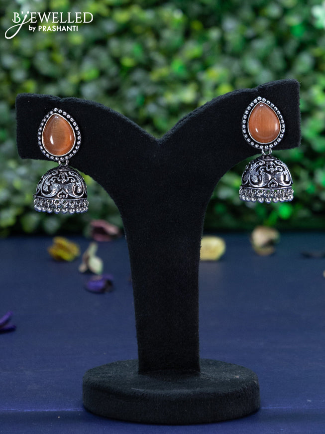 Oxidised jhumka with honey shade stones and hangings