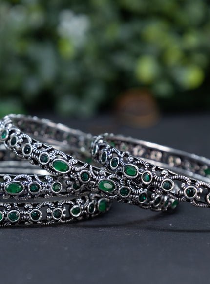 Oxidised bangle with emerald stones