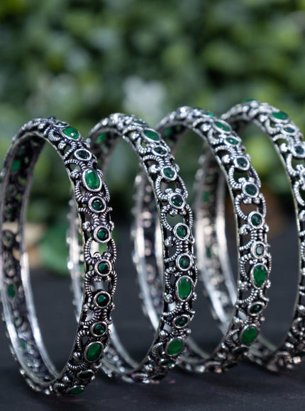 Oxidised bangle with emerald stones