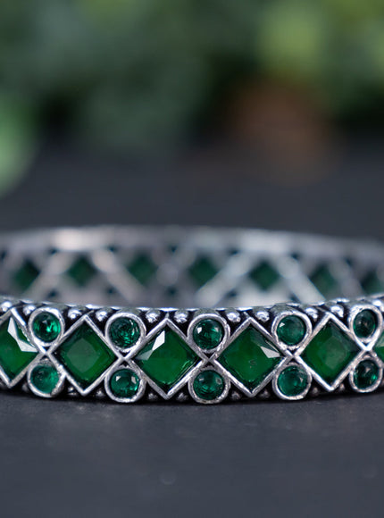 Oxidised bangle with emerald stones