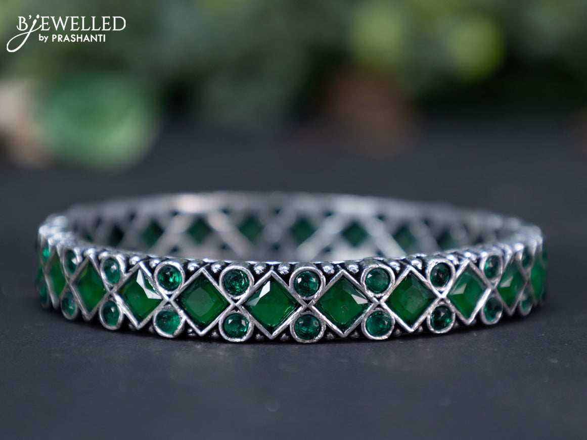 Oxidised bangle with emerald stones