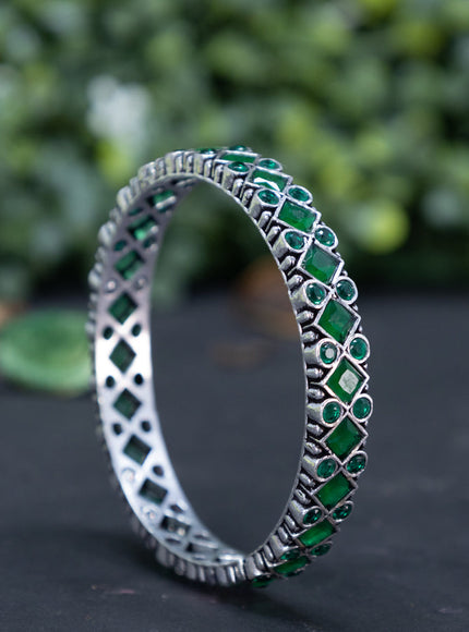 Oxidised bangle with emerald stones