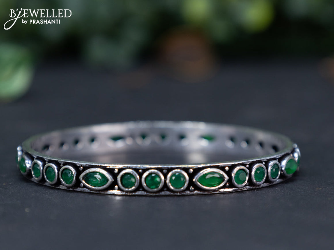 Oxidised bangle with emerald stones