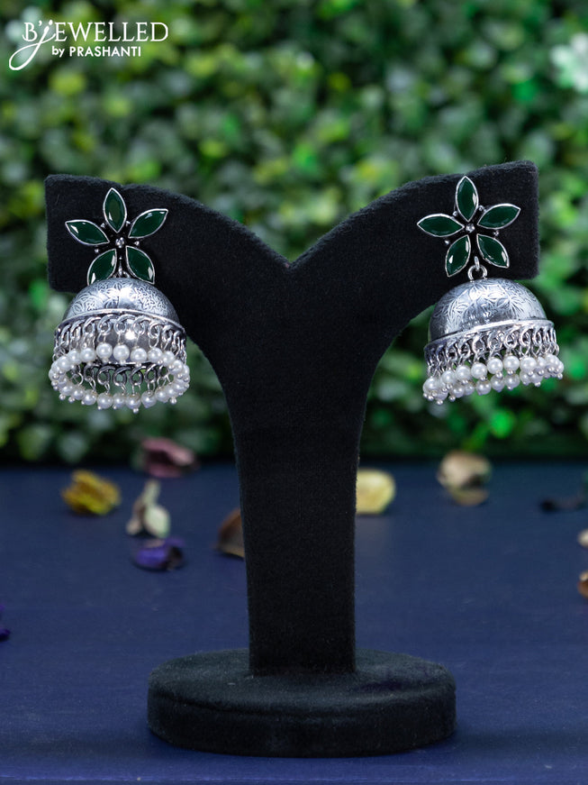 Oxidised jhumka floral design with emerald stones and pearl hangings