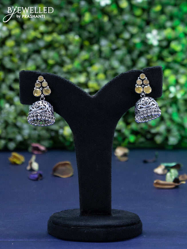 Oxidised jhumka with yellow stones and hangings