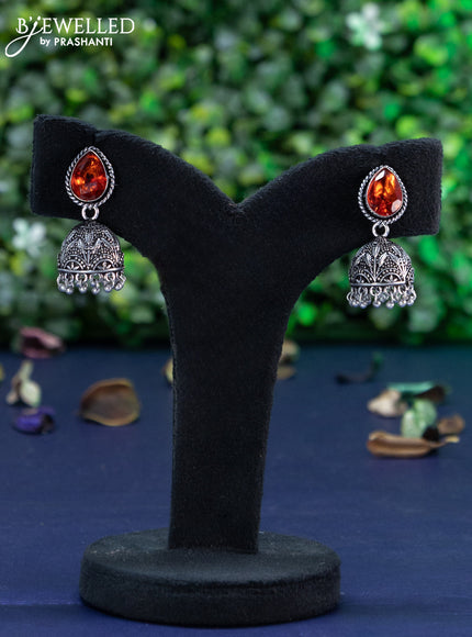 Oxidised jhumka with orange stone and hangings