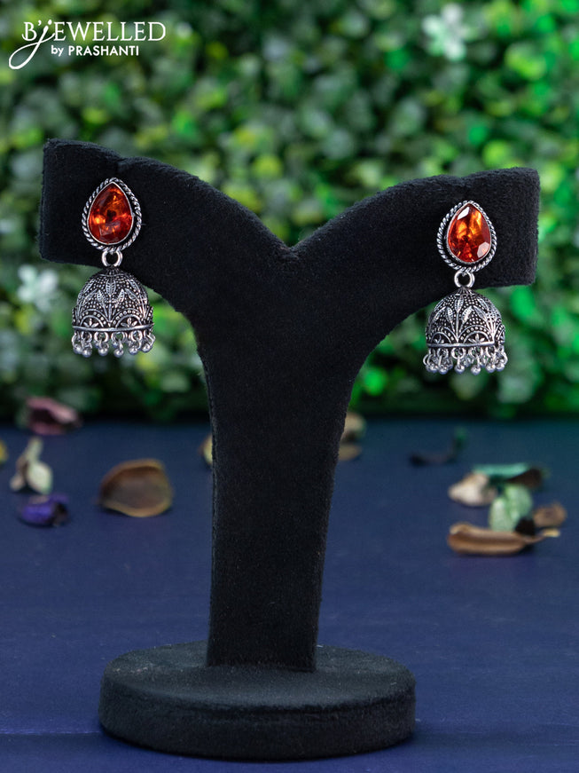 Oxidised jhumka with orange stone and hangings