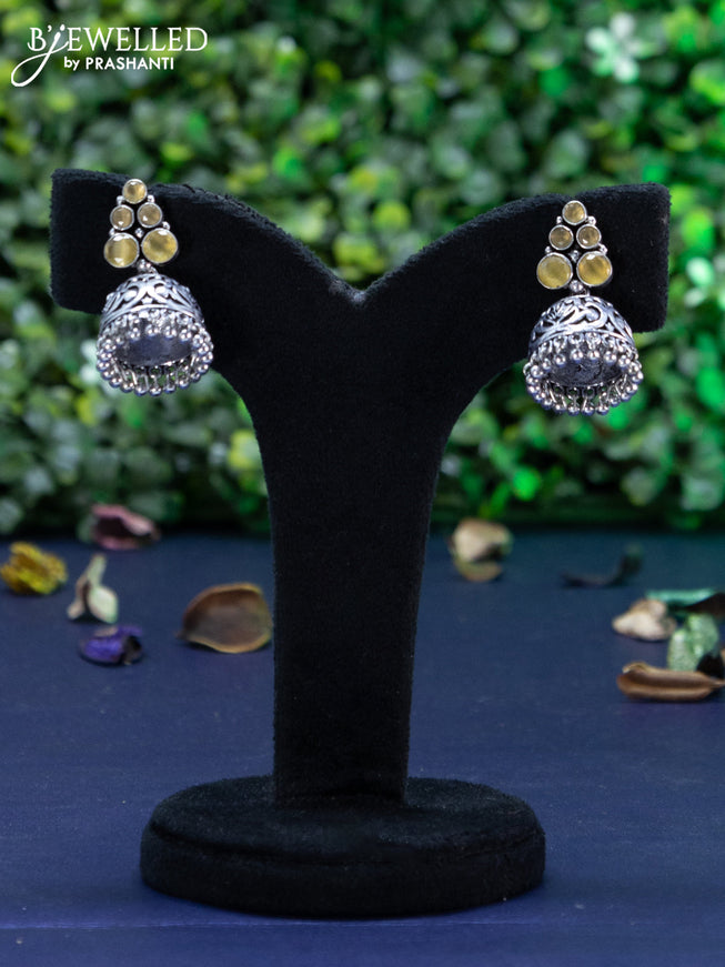 Oxidised jhumka with yellow stones and hangings