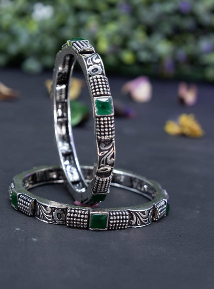 Oxidised  floral design bangles with emerald stones