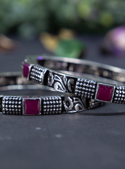 Oxidised  floral design bangles with ruby stones