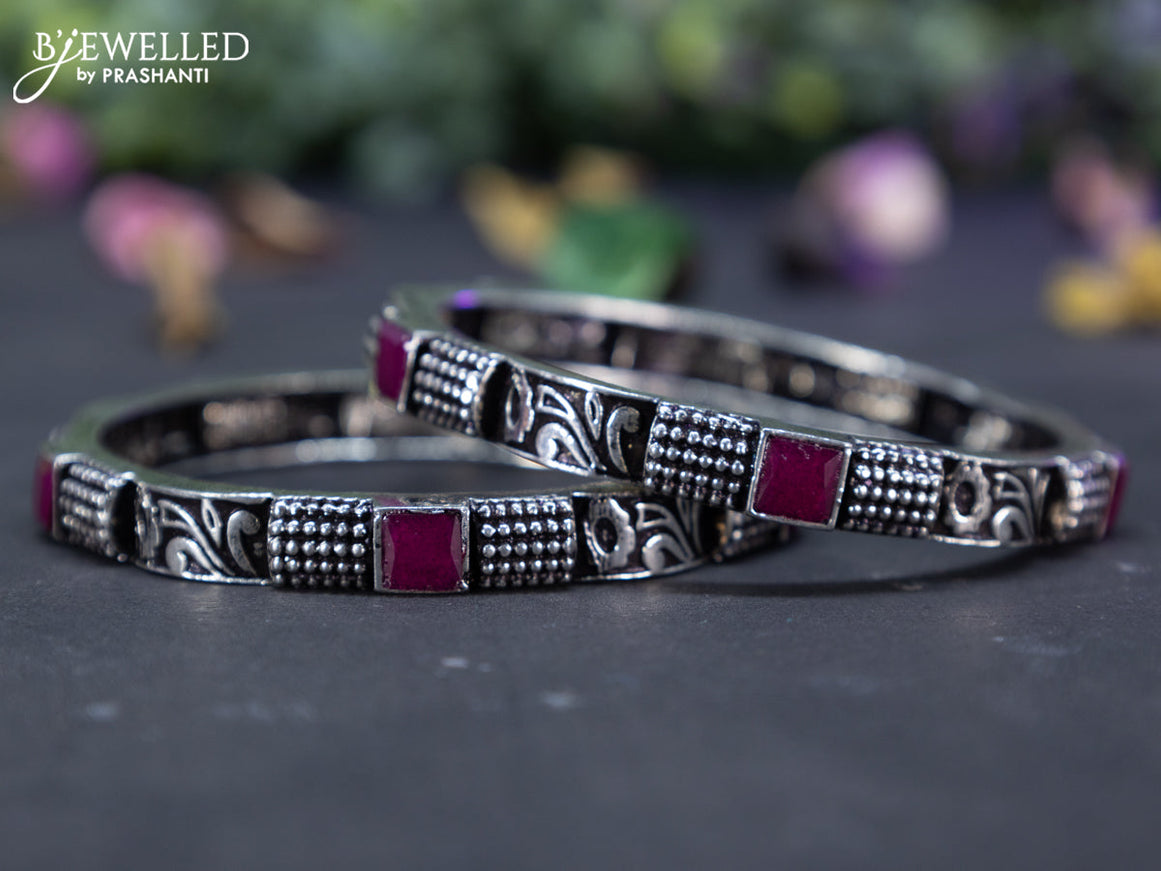 Oxidised  floral design bangles with ruby stones