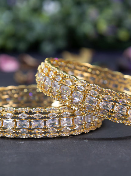 Zircon bangles with cz stones in gold finish