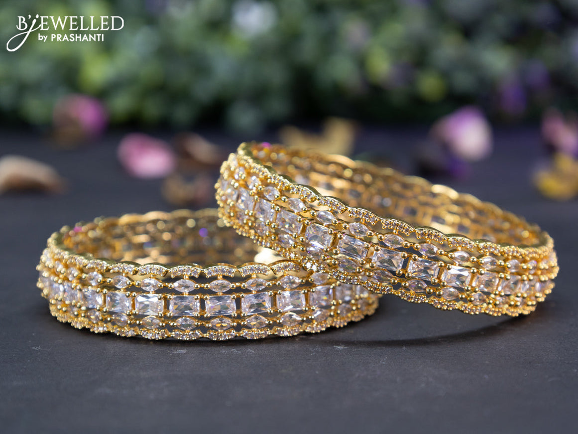 Zircon bangles with cz stones in gold finish