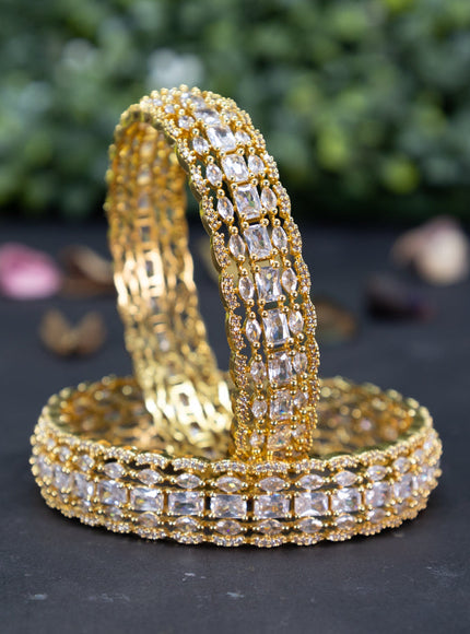 Zircon bangles with cz stones in gold finish