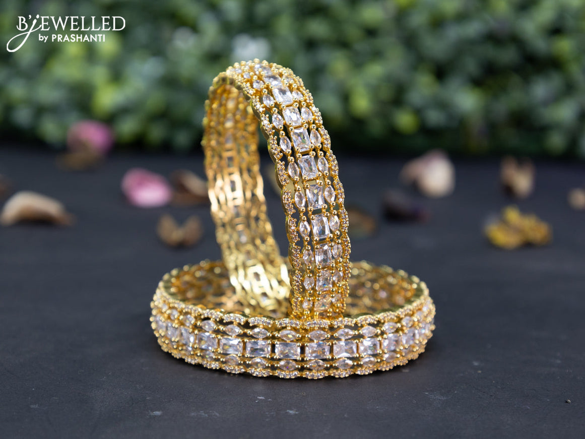 Zircon bangles with cz stones in gold finish