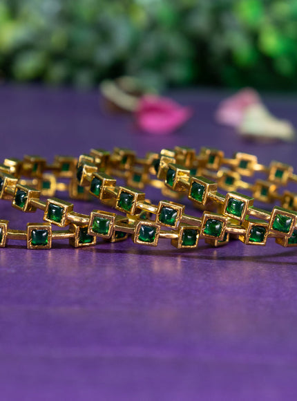 Antique bangle with emerald stones