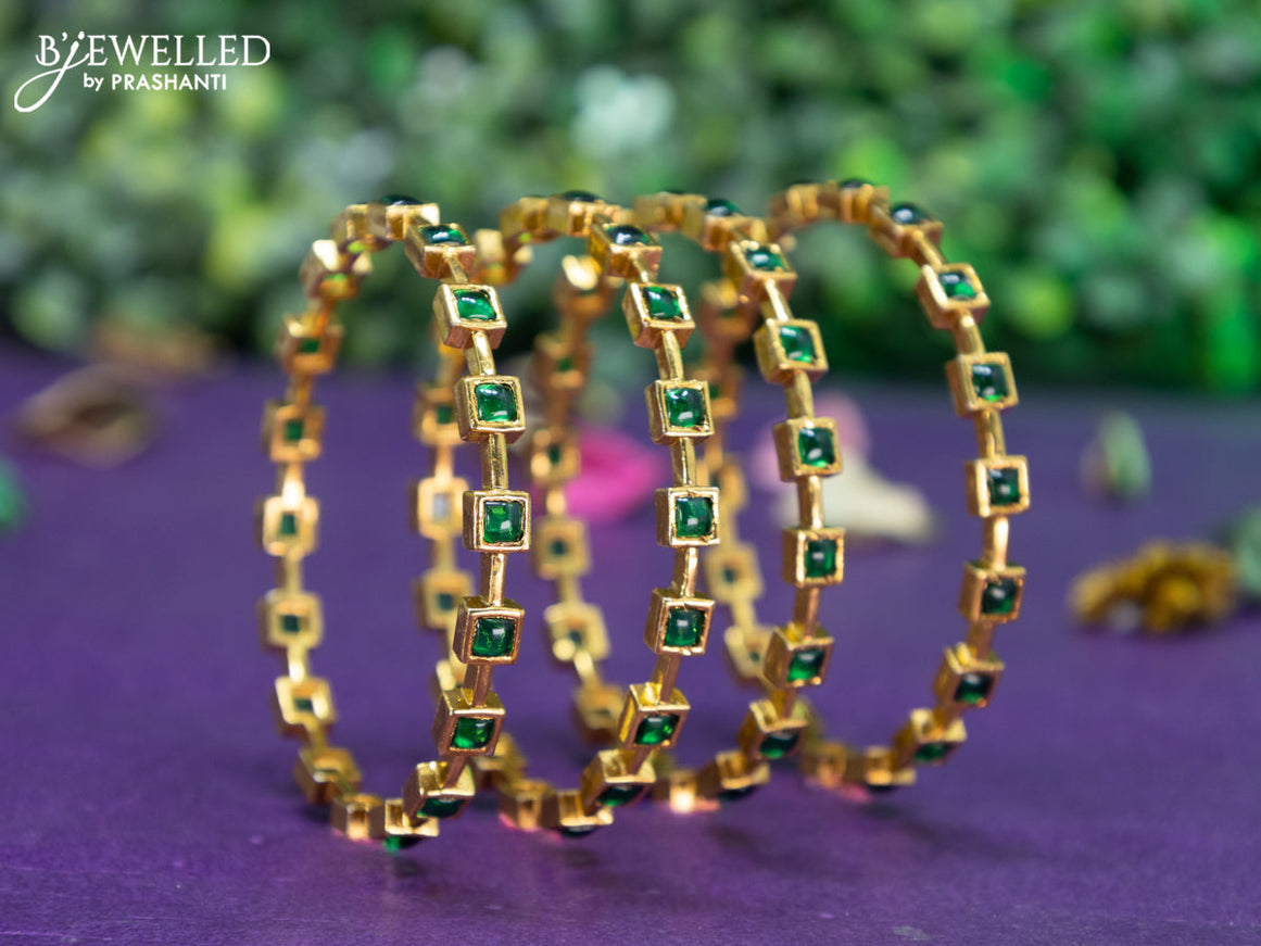 Antique bangle with emerald stones